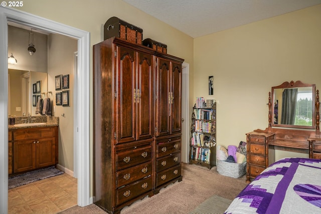 2356 Benjamin Ave, Salem, OR 97304 - bedroom with a sink, light carpet, and connected bathroom