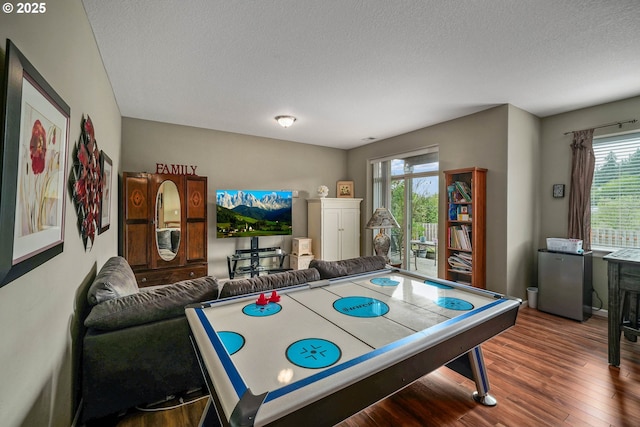 2356 Benjamin Ave, Salem, OR 97304 - playroom featuring wood finished floors, plenty of natural light, and a textured ceiling