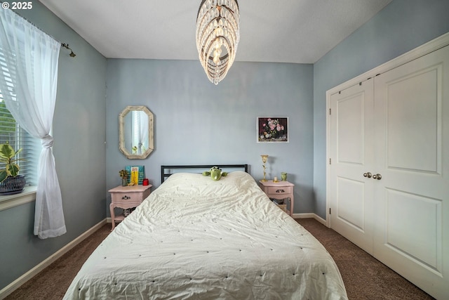 2356 Benjamin Ave, Salem, OR 97304 - bedroom with dark carpet, a chandelier, and baseboards