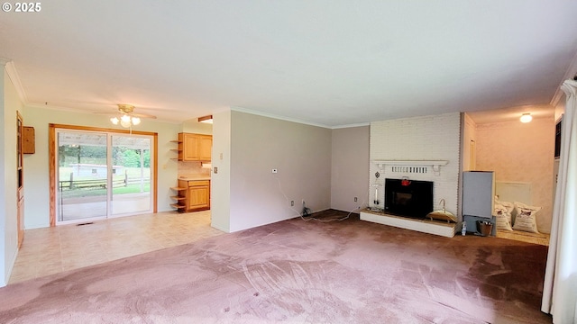 2965 S Myrtle Rd, Myrtle Creek, OR 97457 - unfurnished living room featuring ornamental molding, a brick fireplace, carpet, and a ceiling fan