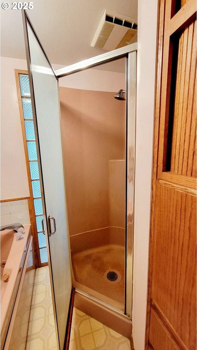 2965 S Myrtle Rd, Myrtle Creek, OR 97457 - bathroom with a stall shower, a garden tub, and tile patterned floors