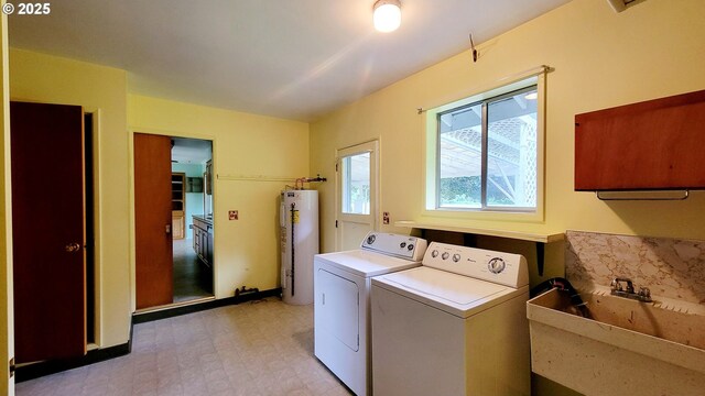 2965 S Myrtle Rd, Myrtle Creek, OR 97457 - washroom featuring electric water heater, washer and clothes dryer, and light flooring