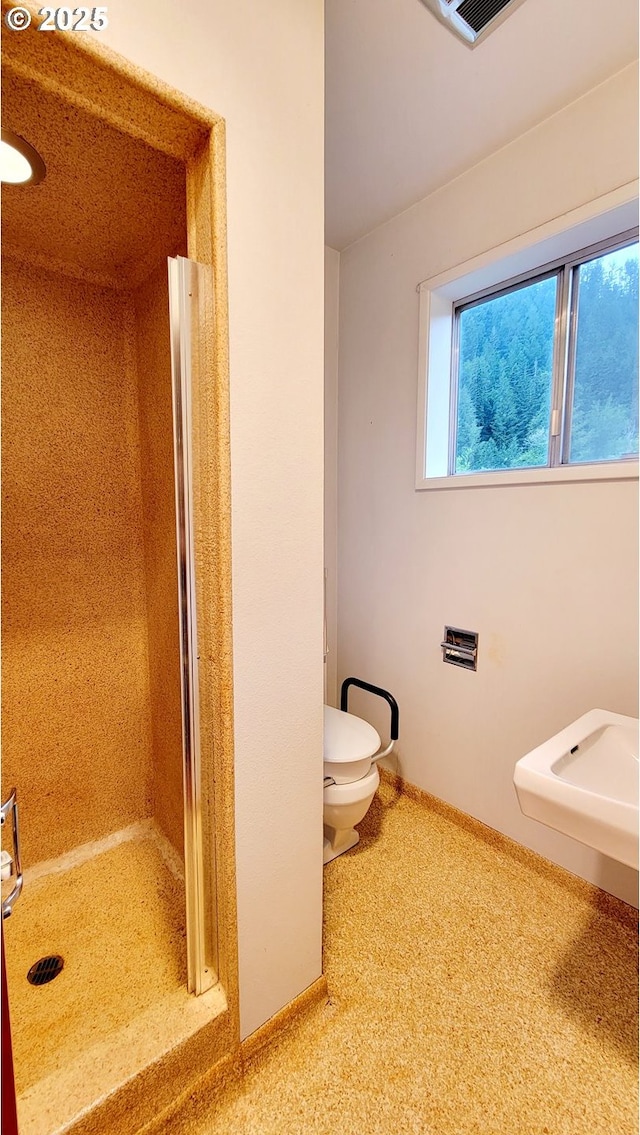 2965 S Myrtle Rd, Myrtle Creek, OR 97457 - full bathroom featuring toilet, a shower stall, and baseboards