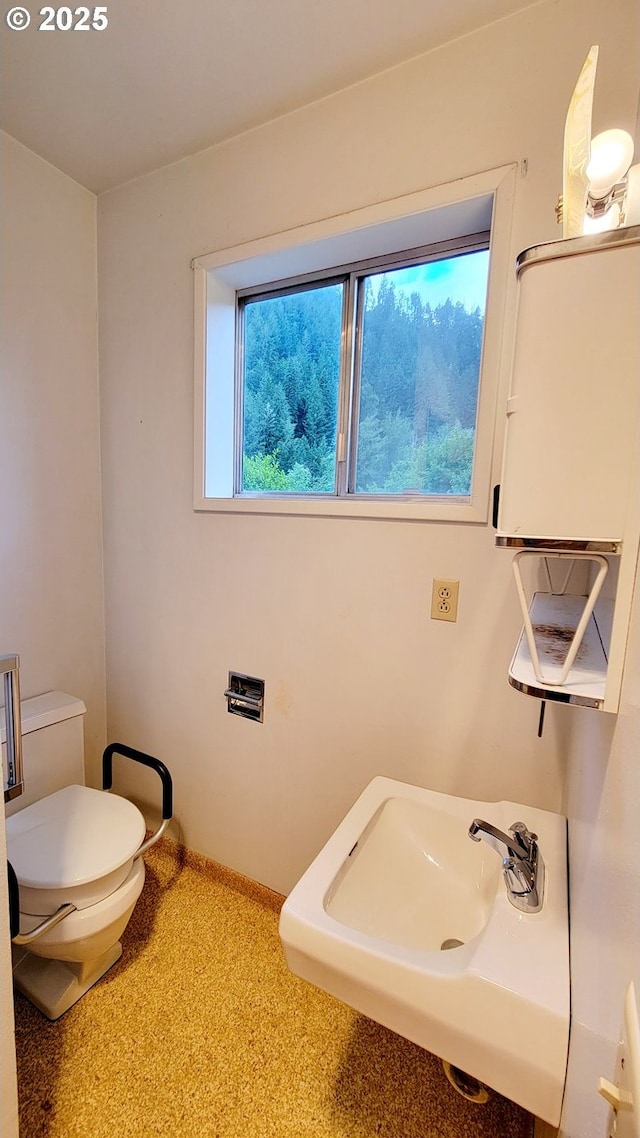 2965 S Myrtle Rd, Myrtle Creek, OR 97457 - half bathroom with healthy amount of natural light, toilet, and a sink