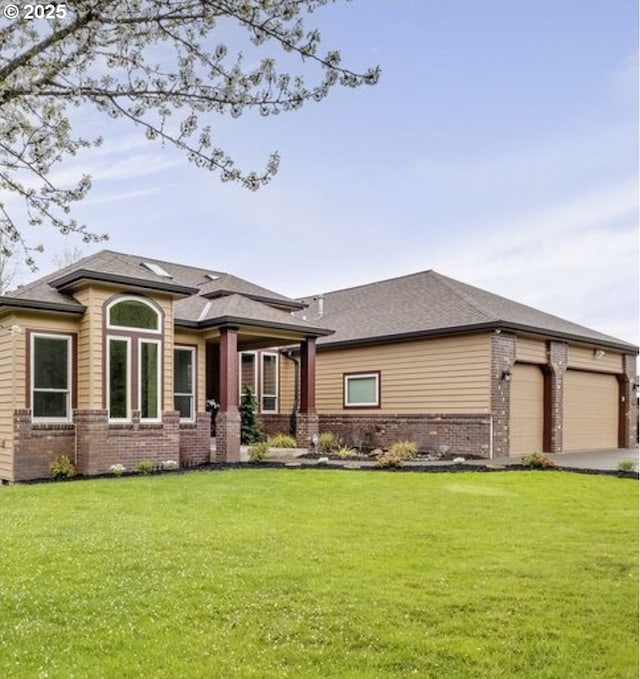 610 NE Sundance Ct, Hillsboro, OR 97124 - view of front of house featuring brick siding, a garage, a front lawn, and concrete driveway