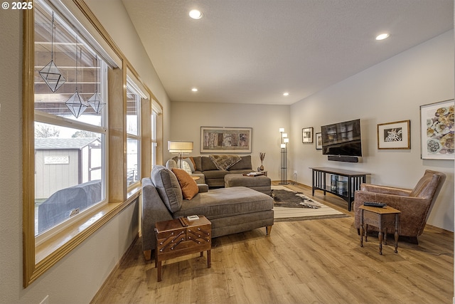 610 NE Sundance Ct, Hillsboro, OR 97124 - living room featuring light wood-style floors, baseboards, and recessed lighting