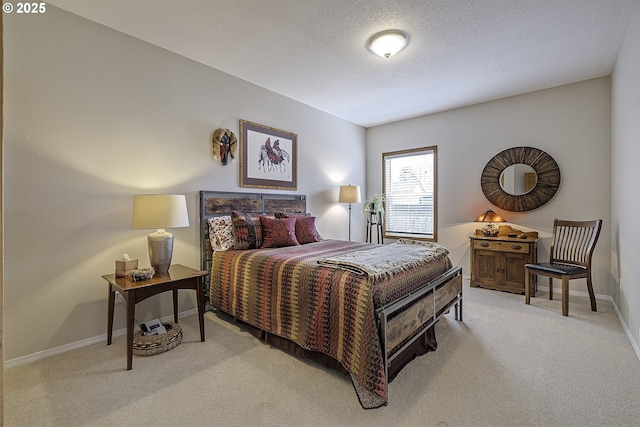 610 NE Sundance Ct, Hillsboro, OR 97124 - bedroom featuring light colored carpet, baseboards, and a textured ceiling