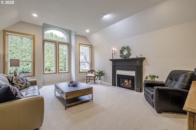 610 NE Sundance Ct, Hillsboro, OR 97124 - living area featuring lofted ceiling, light carpet, a fireplace, baseboards, and recessed lighting