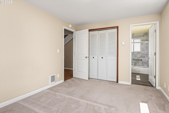 32475 Beymer Rd, Eugene, OR 97405 - unfurnished bedroom featuring carpet, baseboards, a closet, and connected bathroom
