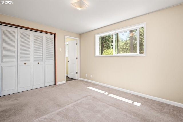 32475 Beymer Rd, Eugene, OR 97405 - unfurnished bedroom featuring baseboards, carpet floors, and a closet
