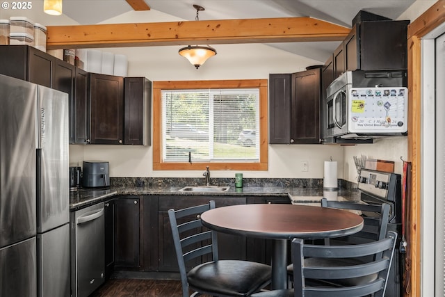 32475 Beymer Rd, Eugene, OR 97405 - kitchen featuring stainless steel appliances, a sink, dark brown cabinets, and dark wood-style floors