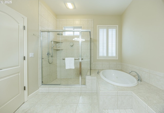 full bathroom featuring a stall shower, tile patterned flooring, and a bath