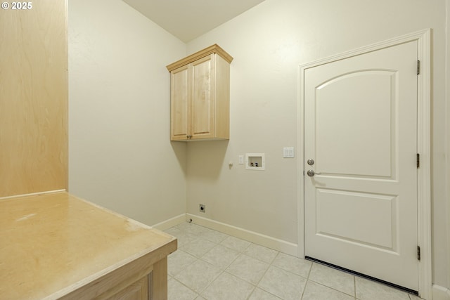 laundry room with light tile patterned flooring, washer hookup, baseboards, cabinet space, and electric dryer hookup