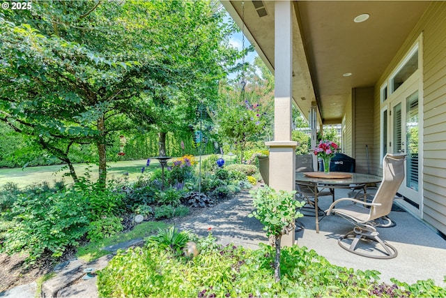 view of patio featuring outdoor dining area