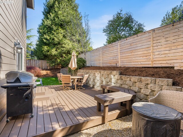 14428 Holly Springs Rd, Lake Oswego, OR 97035 - wooden terrace featuring outdoor dining space, a fenced backyard, and area for grilling