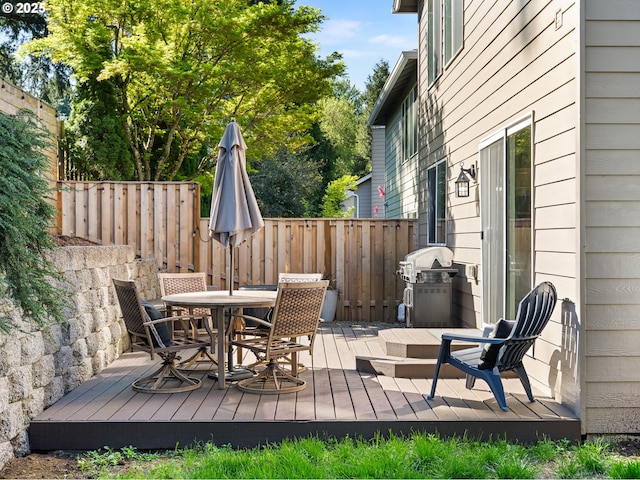14428 Holly Springs Rd, Lake Oswego, OR 97035 - deck with outdoor dining area and a grill