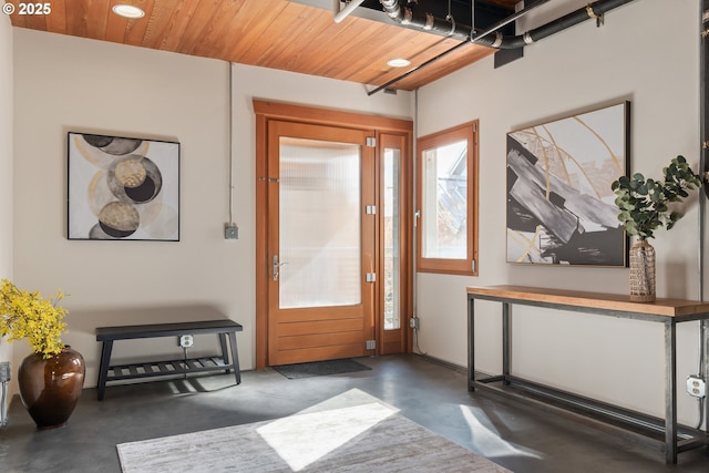 321 Mill St Unit 4, Eugene, OR 97401 - foyer entrance featuring wood ceiling, concrete floors, and recessed lighting
