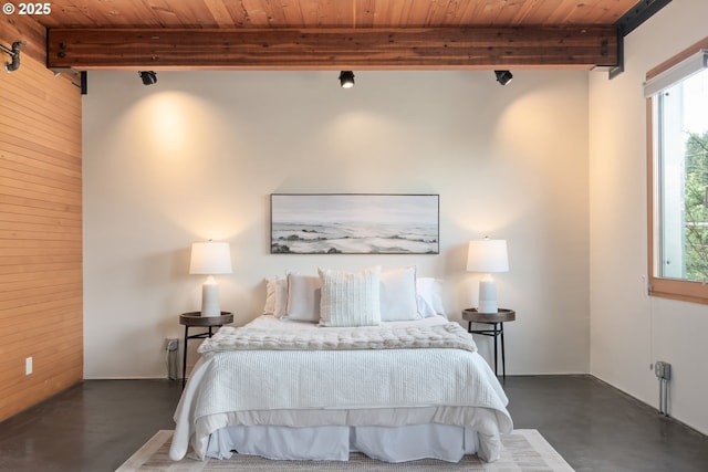 321 Mill St Unit 4, Eugene, OR 97401 - bedroom featuring beam ceiling, finished concrete floors, and wood ceiling
