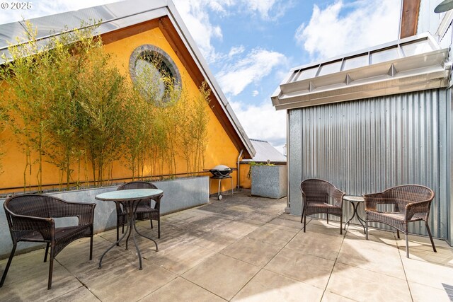 321 Mill St Unit 4, Eugene, OR 97401 - view of patio featuring grilling area