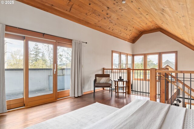 321 Mill St Unit 4, Eugene, OR 97401 - living area featuring wood finished floors, baseboards, wooden ceiling, and lofted ceiling