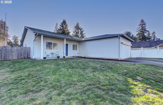 single story home with a garage and a front yard