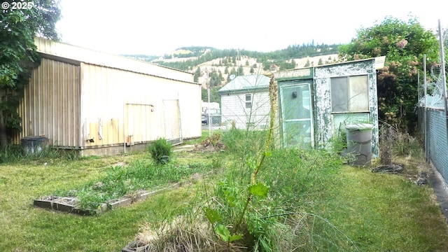 610 Bluff Rd, Klickitat, WA 98628 - view of outbuilding with a garden
