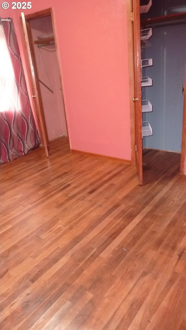 610 Bluff Rd, Klickitat, WA 98628 - unfurnished bedroom featuring wood finished floors