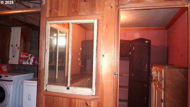 610 Bluff Rd, Klickitat, WA 98628 - laundry room with washing machine and clothes dryer and ornamental molding