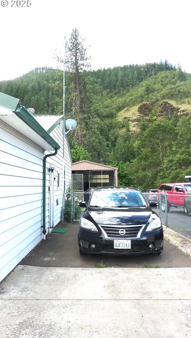610 Bluff Rd, Klickitat, WA 98628 - view of parking featuring a view of trees