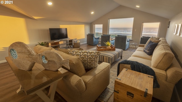 7304 SW Pacific Coast Hwy, Waldport, OR 97394 - living area featuring wood finished floors, lofted ceiling, and recessed lighting