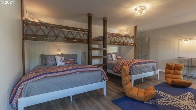 7304 SW Pacific Coast Hwy, Waldport, OR 97394 - bedroom featuring wood finished floors and baseboards