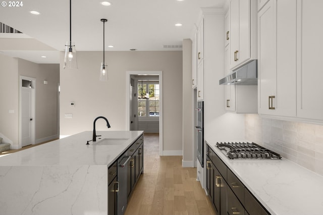 17733 NW Layla Ter Lot 6, Portland, OR 97229 - kitchen with a sink, stainless steel gas stovetop, white cabinets, light wood-type flooring, and recessed lighting