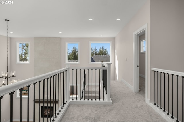 17733 NW Layla Ter Lot 6, Portland, OR 97229 - hallway featuring a chandelier, carpet, recessed lighting, and an upstairs landing
