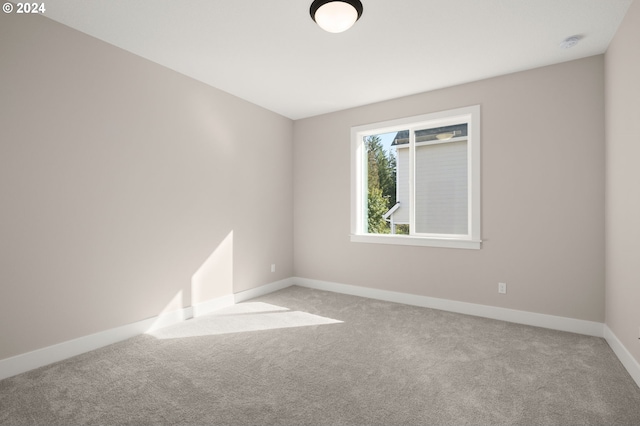 17733 NW Layla Ter Lot 6, Portland, OR 97229 - unfurnished room with carpet floors, baseboards, and a smoke detector