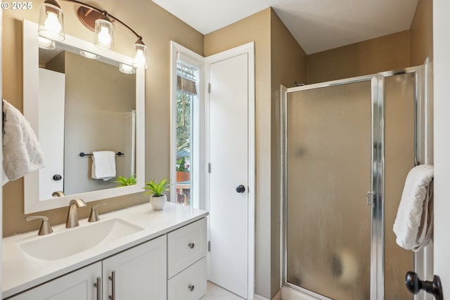 bathroom featuring vanity and walk in shower