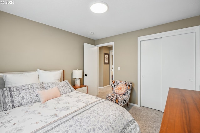 carpeted bedroom with a closet