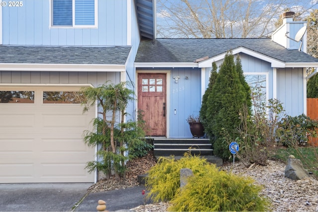 property entrance with a garage