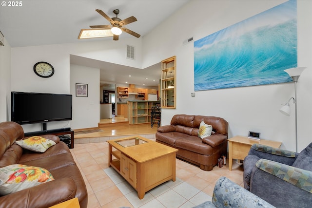 184 NE 10th Ave, Canby, OR 97013 - living area featuring ceiling fan, light tile patterned floors, and high vaulted ceiling
