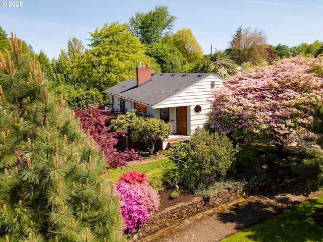 7024 NE 23rd Ave, Portland, OR 97211 - view of front of home with a chimney