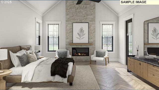 bedroom with crown molding, light parquet flooring, and a fireplace