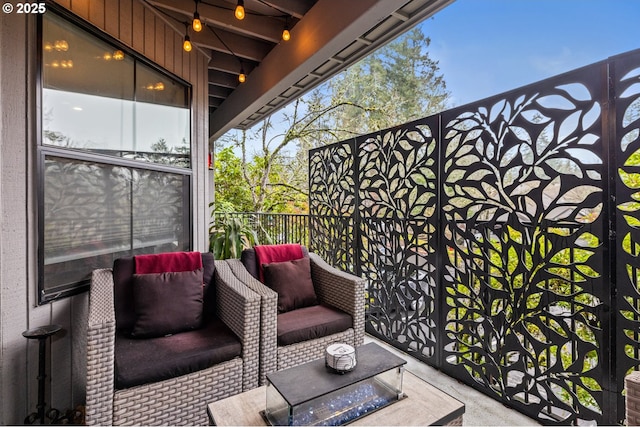 view of patio / terrace featuring a balcony