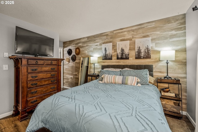 bedroom with wooden walls