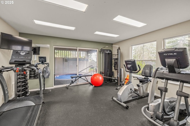 workout area featuring a wealth of natural light