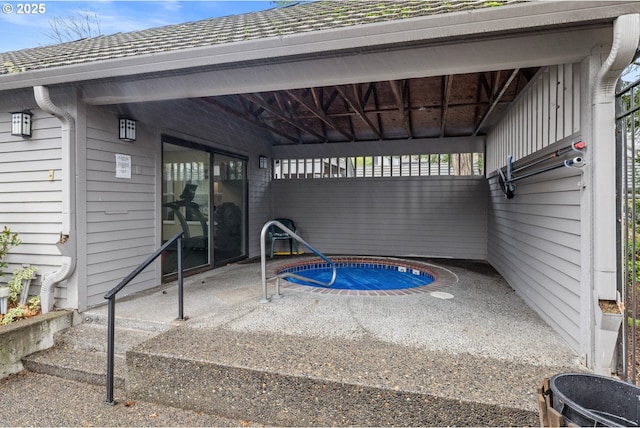 view of swimming pool with a patio area