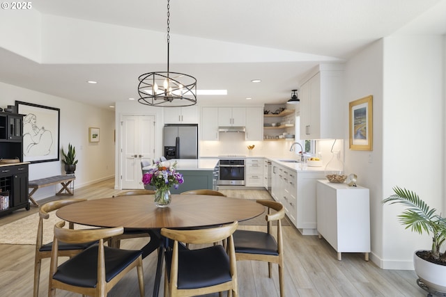 17385 NE Fairview Dr, Dundee, OR 97115 - dining room with light wood-style flooring, a chandelier, recessed lighting, vaulted ceiling, and baseboards