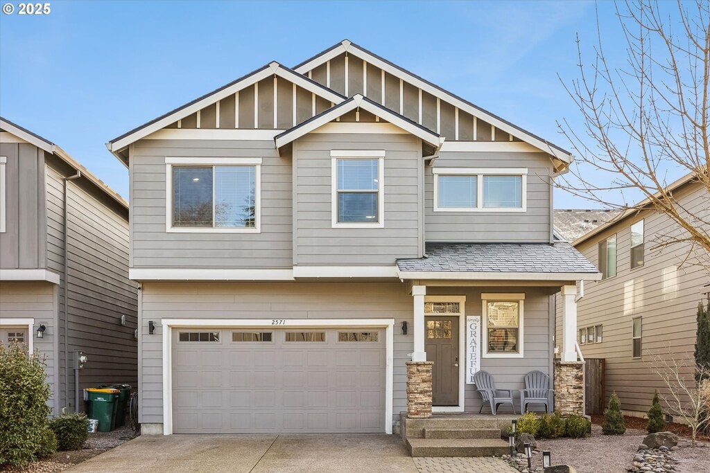 craftsman-style home featuring a garage