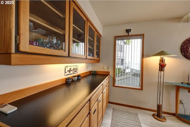 bar featuring baseboards