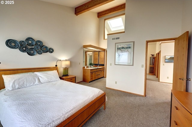 bedroom with light carpet, a skylight, visible vents, beamed ceiling, and high vaulted ceiling