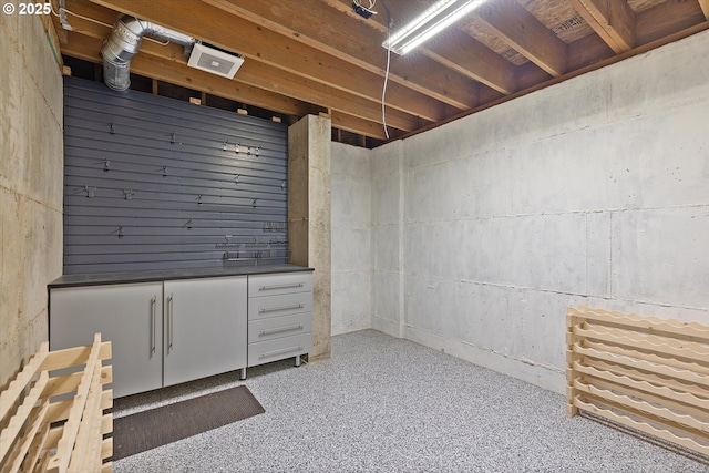 unfinished basement with visible vents