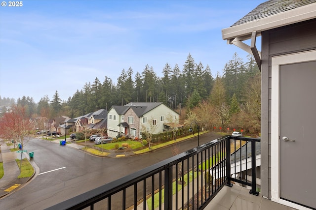 balcony featuring a residential view